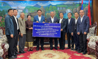 LFNC President Delivers 100 Tons of Rice, 200 Million Kip to Flood Victims in Champasak